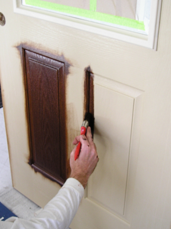 How do you stain a fiberglass door?