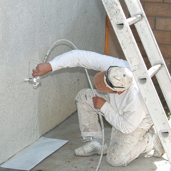 Painting a stucco house cost