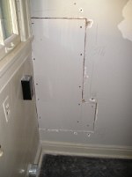 Large hole in wall with drywall installed. Stud to stud method.
