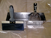 Stainless steel drywall pan and taping knifes.