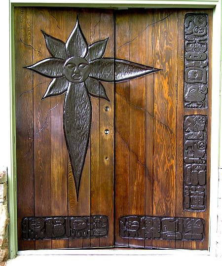 Custom wood entry doors refinished.