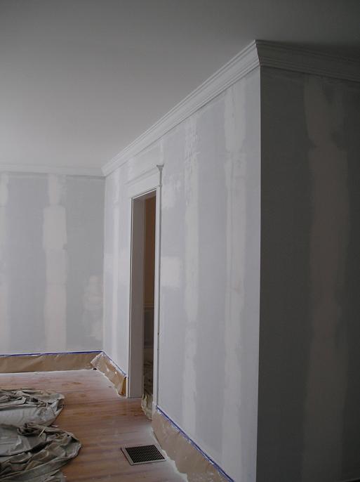Wallpapered walls primed with Shellac, patched and ready for paint.